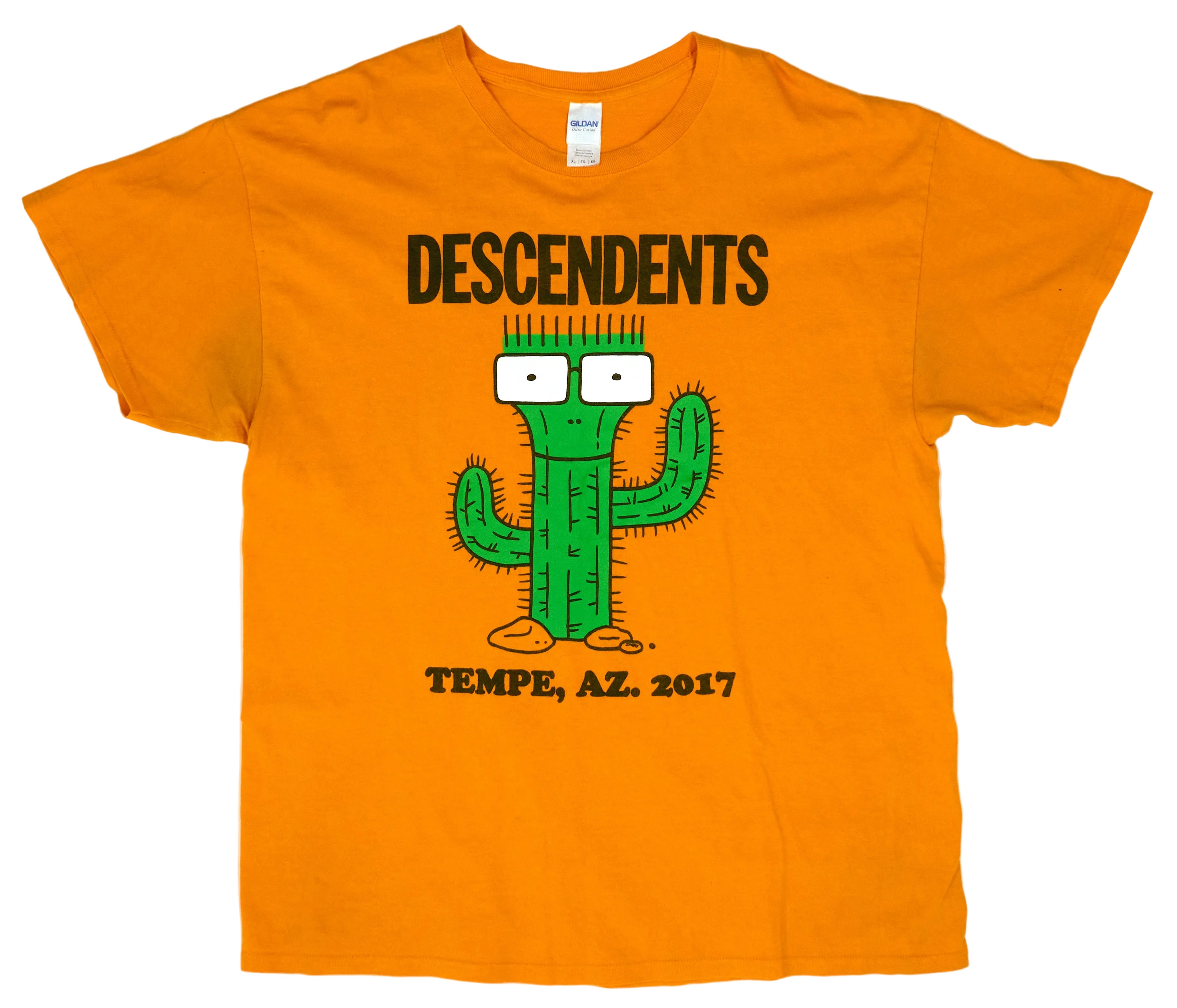 An orange shirt with a graphic of a cactus and the text 'DESCENDS' on it, along with the band's logo and the date '2017'.
