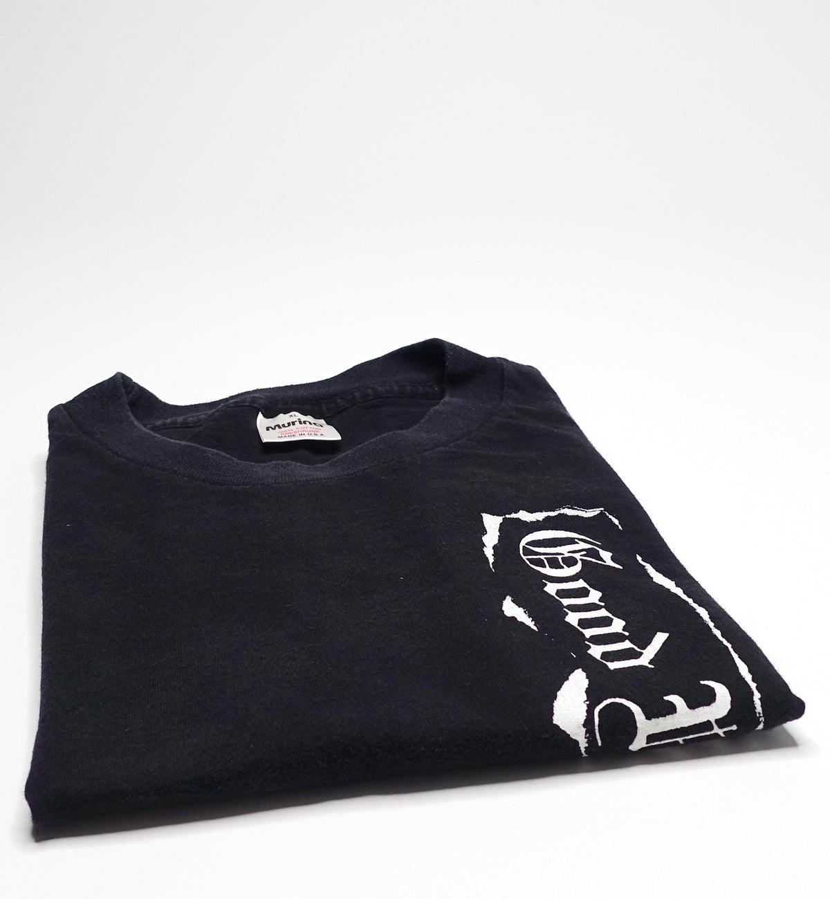 A black navy blue t-shirt with a white band and text design on the front that reads 'Good Riddance - This Shirt Repels Fascists 1995 Tour Shirt' size XL.