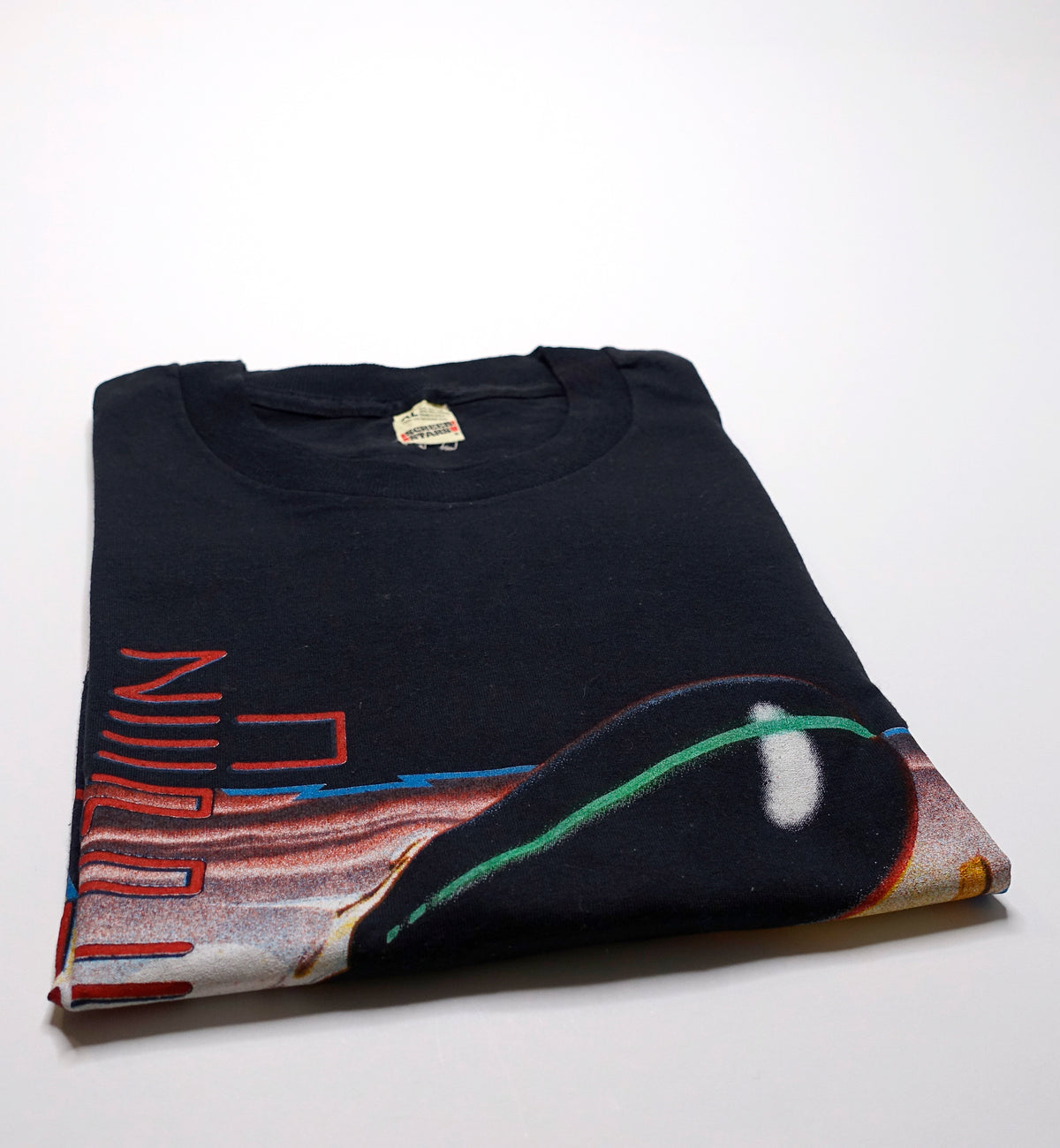 Folded black t-shirt with a graphic print related to Led Zeppelin, displayed on a white background.