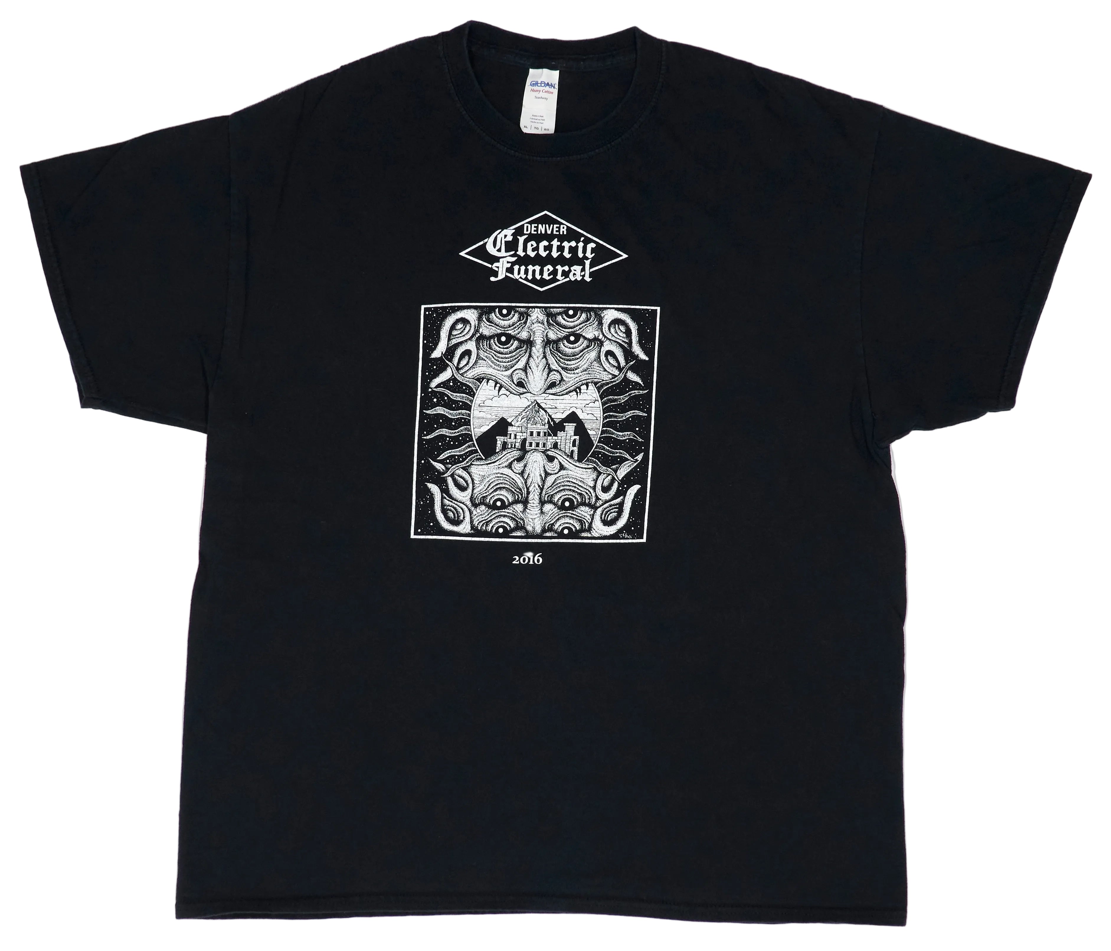 Black t-shirt with a graphic print of a skull and text related to a music festival on the front.