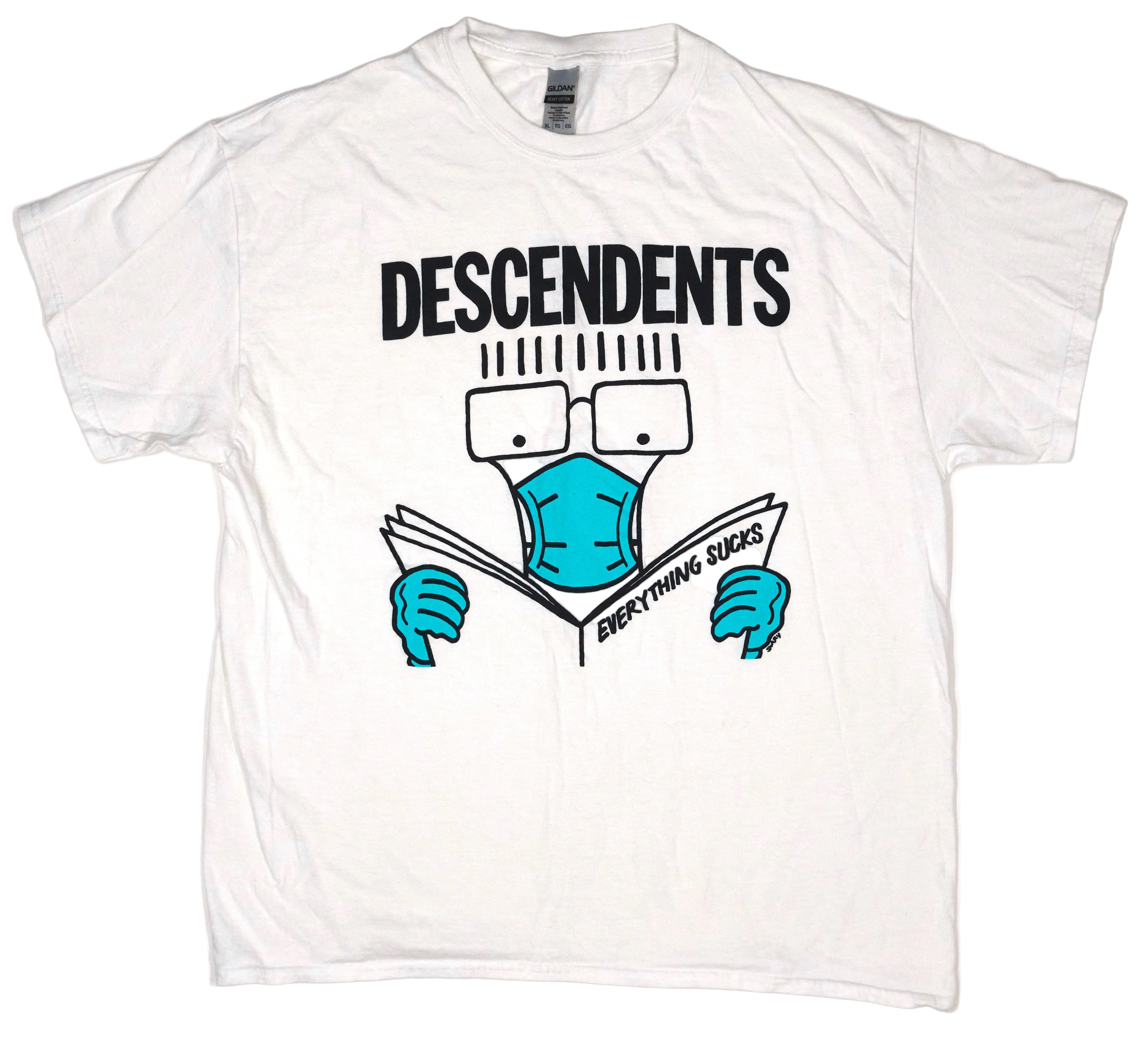A white T-shirt with the Descendents band logo and a graphic of a character wearing a mask and reading a newspaper.