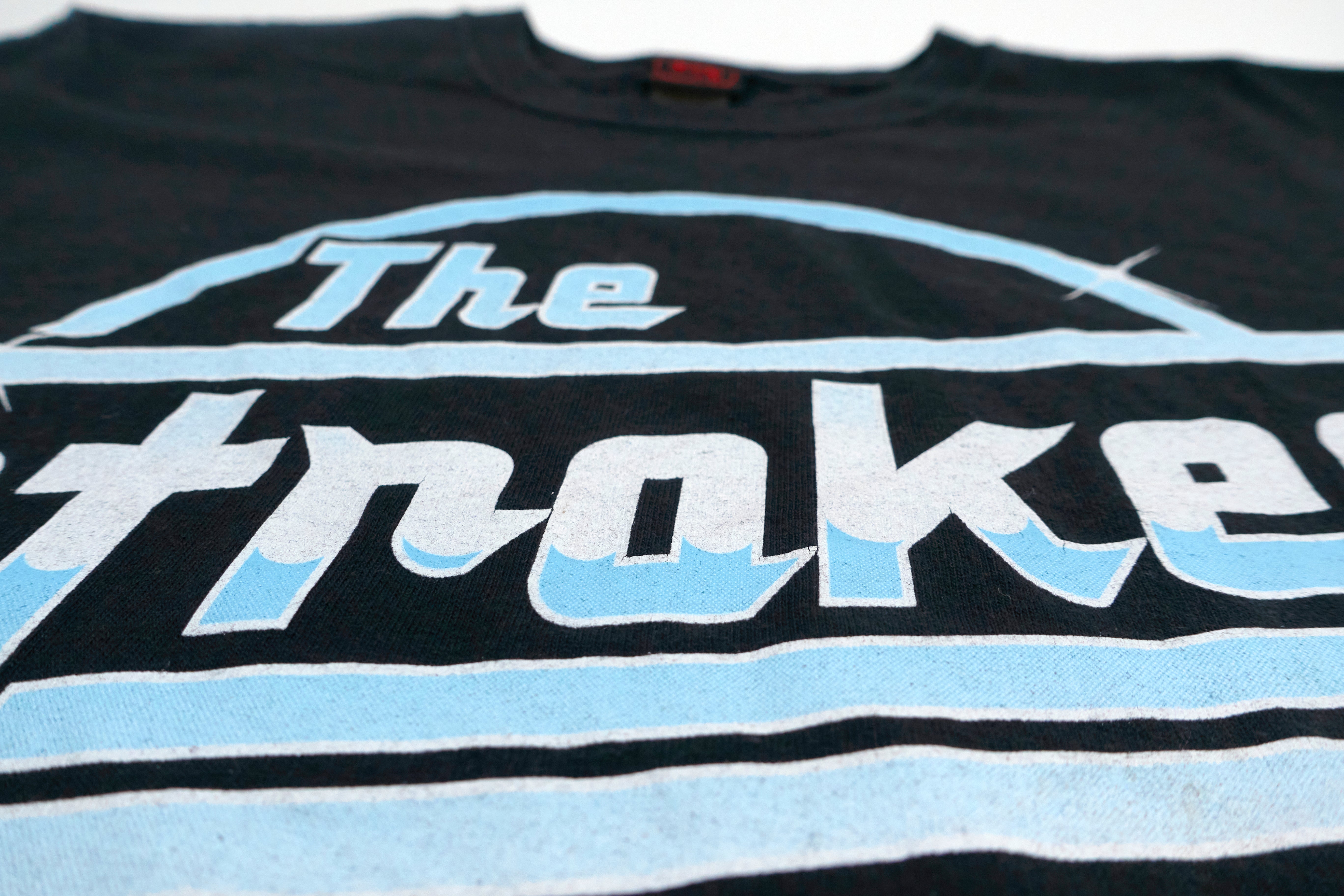 the Strokes - Chrome Logo Tour Shirt Size (Mis-Labeled Large) Medium